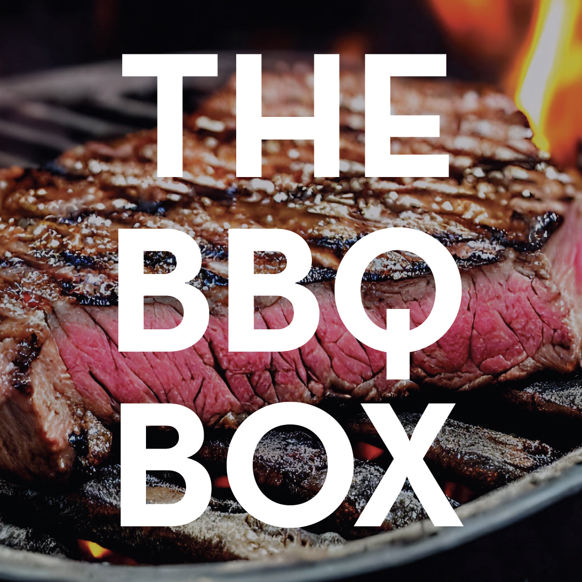 THE BBQ BOX graphic with a steak cooking on a grill